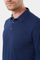 ligne jerem casual 
 col classique 
 fermeture à 3 boutons 
 ligne fine contrasté sur patte de boutonnage 
 manche longue 
 bas de manche en bord cùte 
 fente cùté contrasté