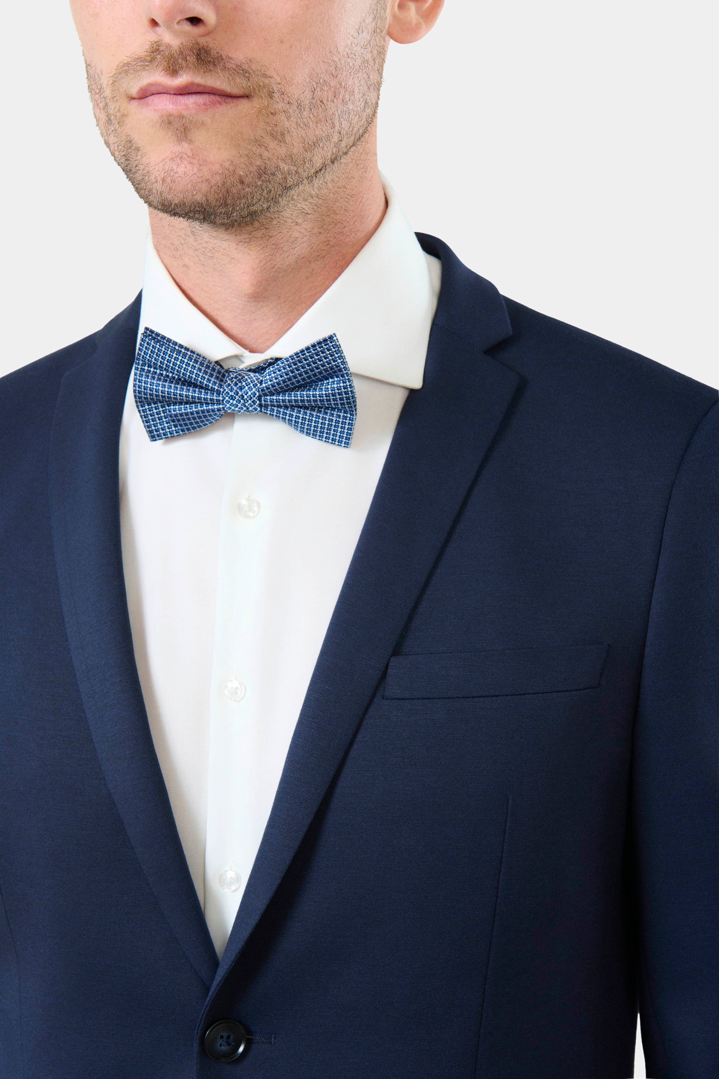 ligne toofashion 
 coupe extra-slim pour un style résolument moderne 
 jersey chiné teint en fil pour plus de confort 
 col cranté 
 simple boutonnage 
 poche poitrine 
 poch...