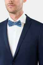 ligne toofashion 
 coupe extra-slim pour un style résolument moderne 
 jersey chiné teint en fil pour plus de confort 
 col cranté 
 simple boutonnage 
 poche poitrine 
 poch...